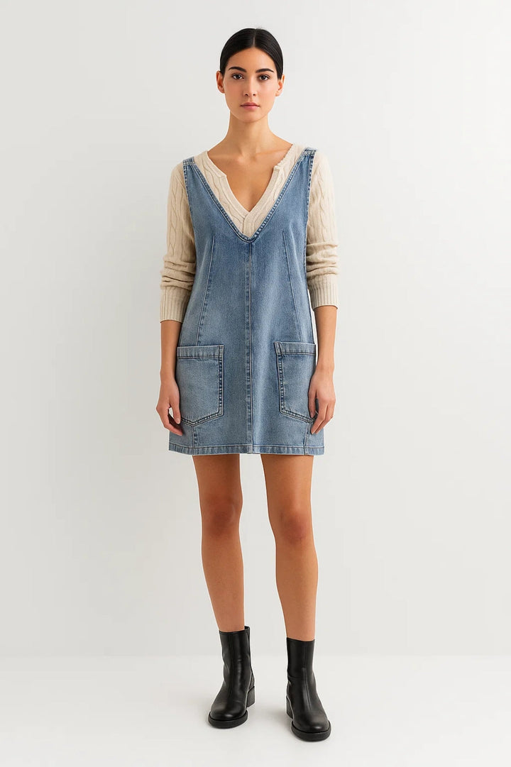 Light blue women's sleeveless V-neck mini dress, perfect for casual daywear and modern, effortless style.
