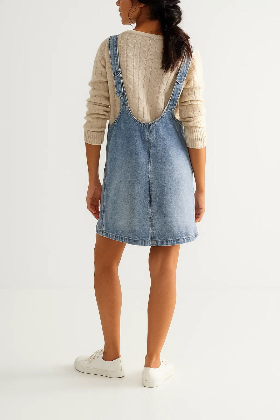 Dark blue sleeveless V-neck mini dress for women, a versatile piece for all-season casual or contemporary looks.