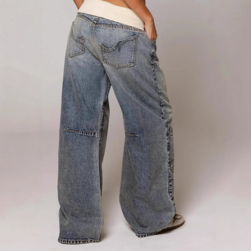 Trendy light blue Y2K baggy jeans for women, wide leg & TikTok style streetwear. Retro comfort.