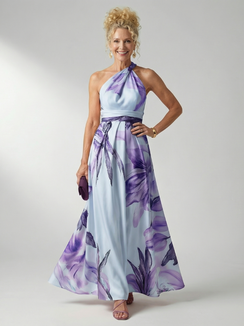 Women's elegant floral halter maxi dress, perfect for warm weather events.