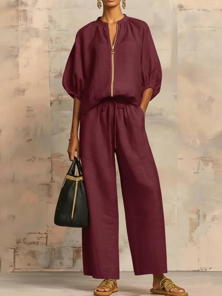 Light green women's relaxed two-piece set: button-up shirt & wide-leg trousers. Casual, comfortable spring/summer outfit.