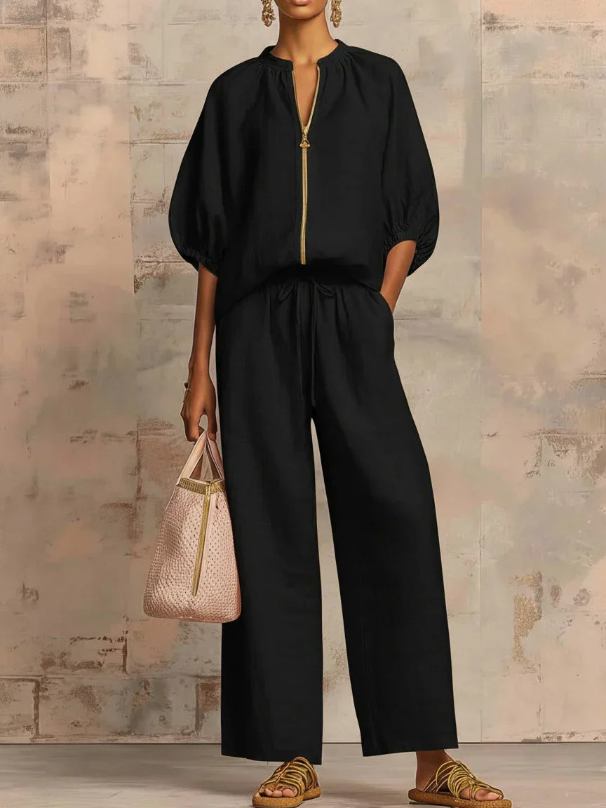 Light blue women's relaxed shirt and wide-leg trousers two-piece set. Perfect comfort wear for spring fashion.