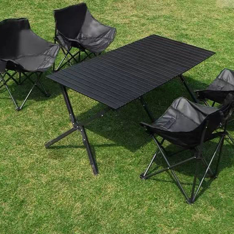 Durable portable picnic table, foldable design for easy transport on camping trips. Unisex outdoor gear.