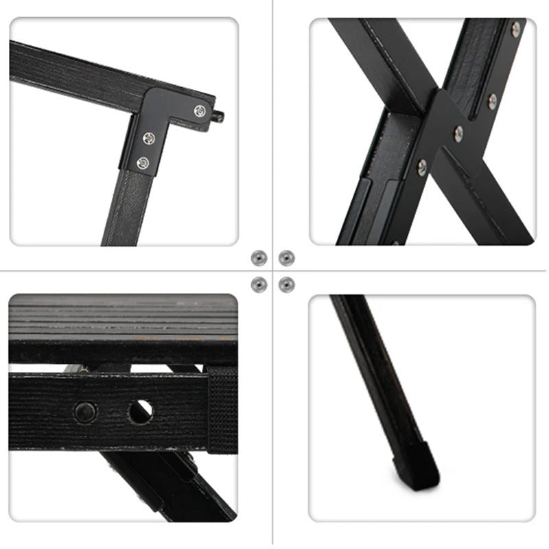 Compact foldable camping table set up for an outdoor picnic, showing its sturdy aluminum frame.