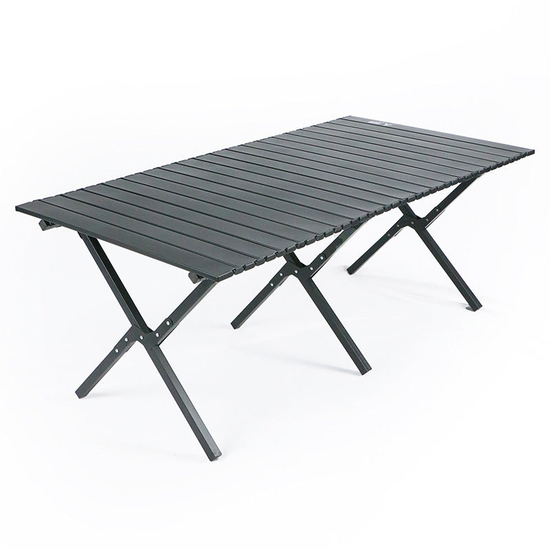 Unisex lightweight camping table, folded for travel, highlighting its portability and compact design.