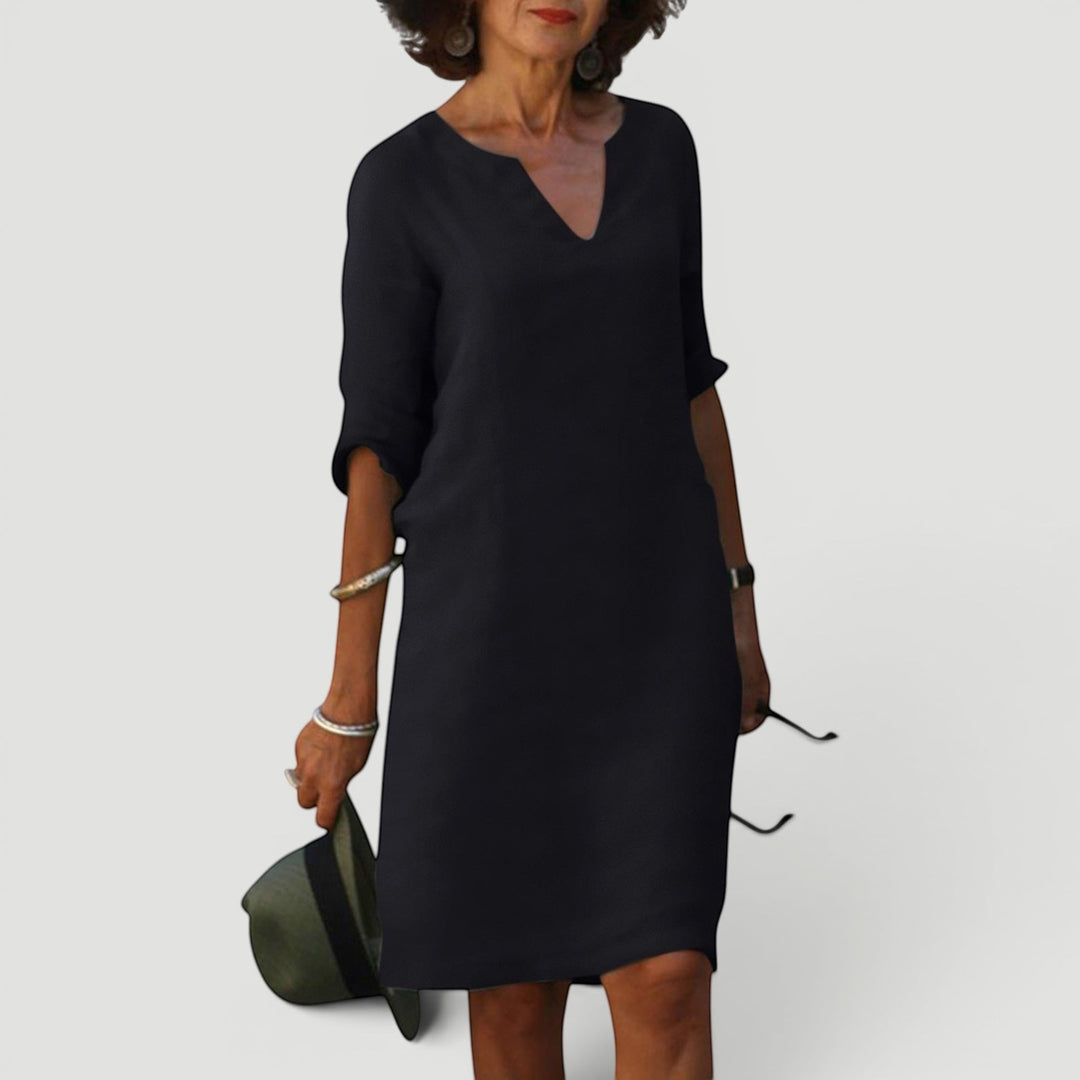 Casual yet elegant women's V-neck 3/4 sleeve midi dress. Lightweight for comfort and versatility.