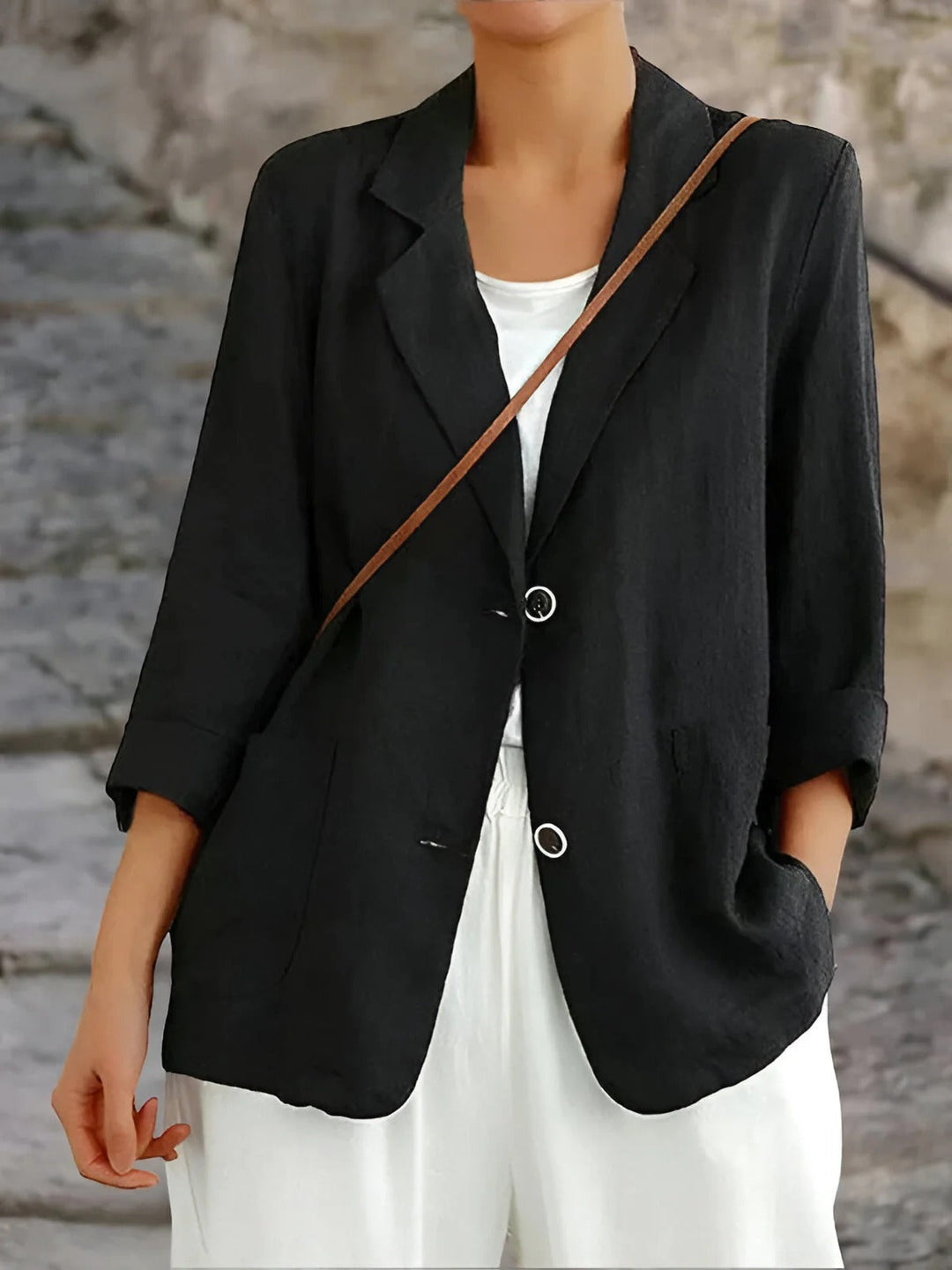 Stylish women's casual blazer, a lightweight layering piece for a versatile and modern office or everyday outfit.