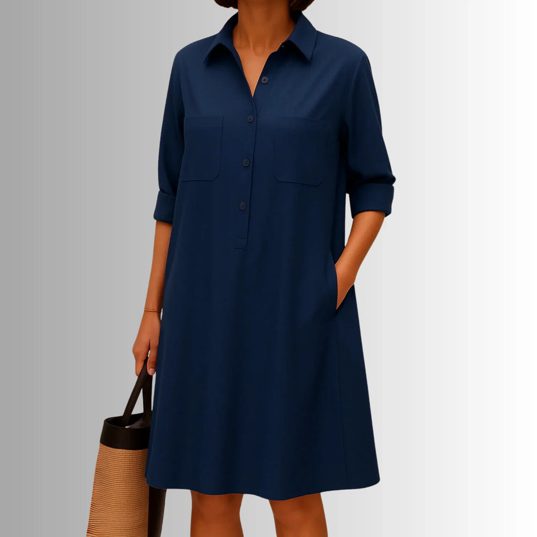 Versatile women's mini shirt dress featuring 3/4-sleeves, button placket, and pockets. Lightweight casual fashion.