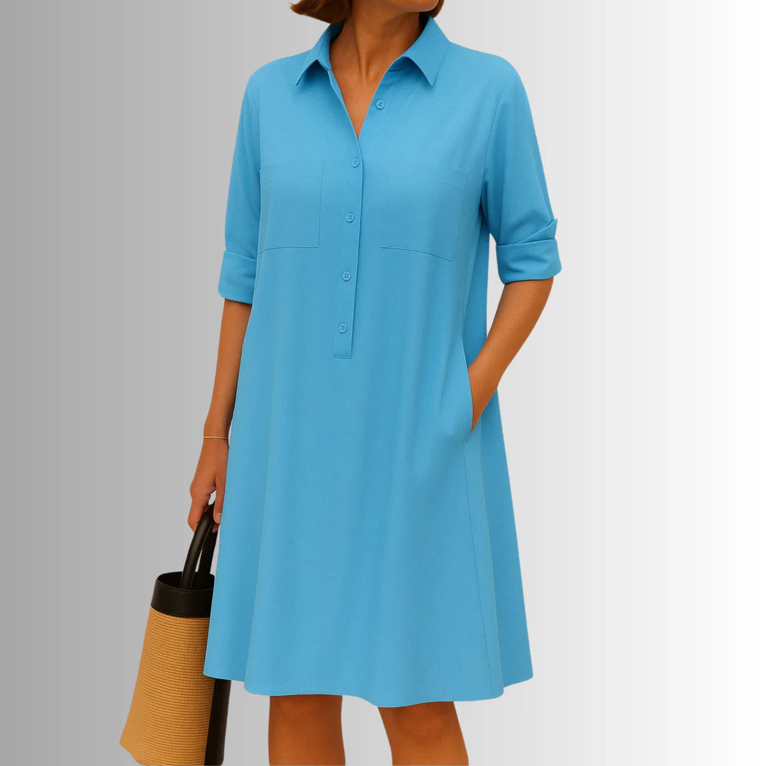 Flowy lightweight mini shirt dress for women. Collared, 3/4-sleeved, and A-line cut. Ideal casual summer wear.