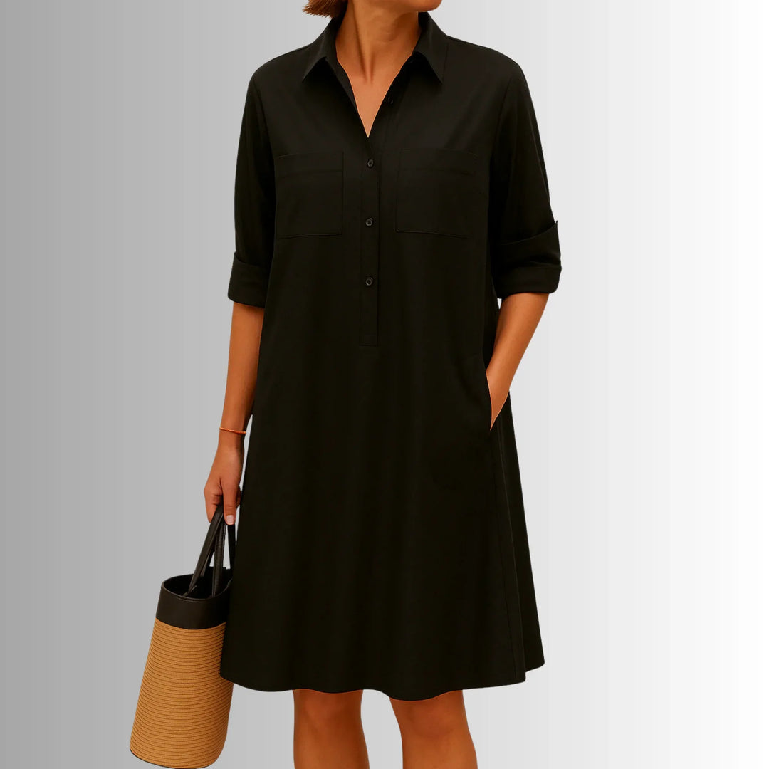 Comfortable lightweight women's casual mini dress. Collared, 3/4-sleeved shirt dress with practical button placket.