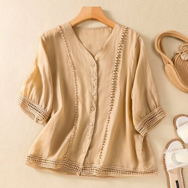 Close-up of artisanal lace detail on Lucia summer blouse for women.