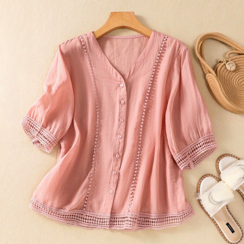 Model wearing Lucia elegant button-up blouse, a casual chic linen blend.