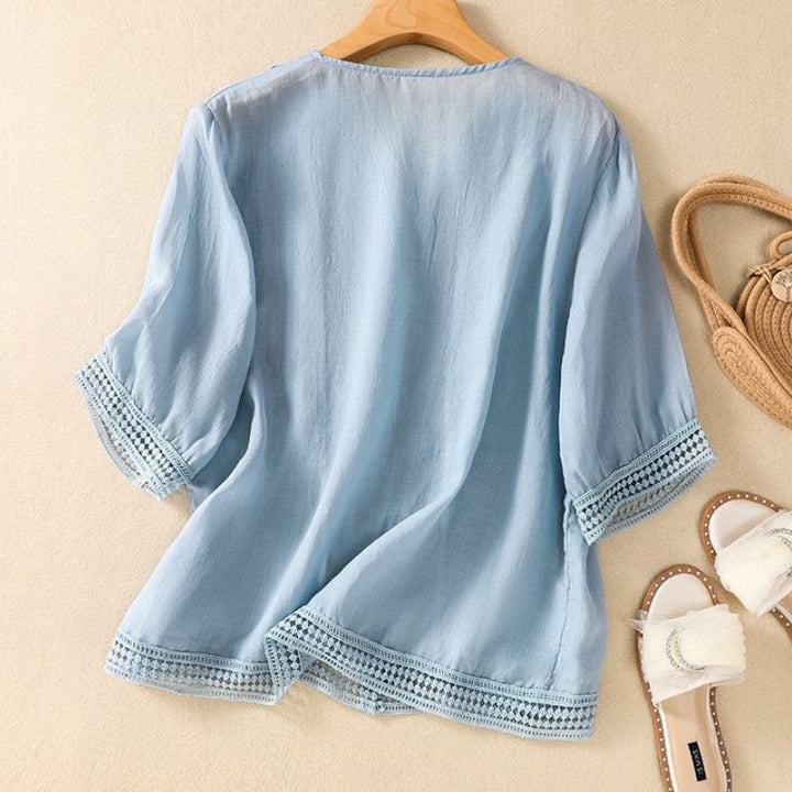 Linen blend fabric detail on Lucia artisanal summer blouse for women.