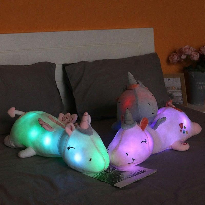 Close-up of LumiGlow glowing unicorn toy, highlighting its comforting plush texture