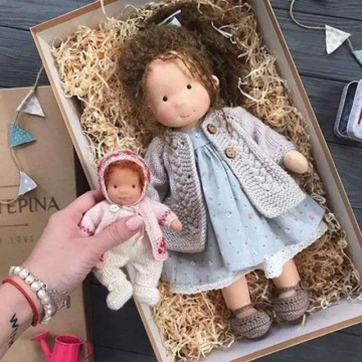 The classic design of the Luna Waldorf handmade plush doll.