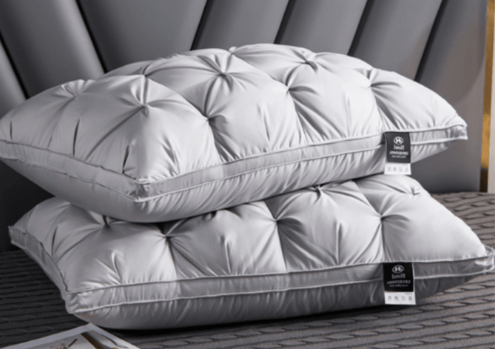 Comfortable goose down bedding pillow providing ergonomic neck and head support for a soft, breathable sleep experience.
