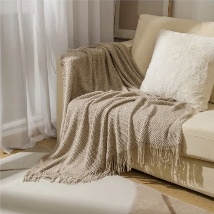 Soft, warm merino-style throw blanket for ultimate comfort in your bedroom or living space.