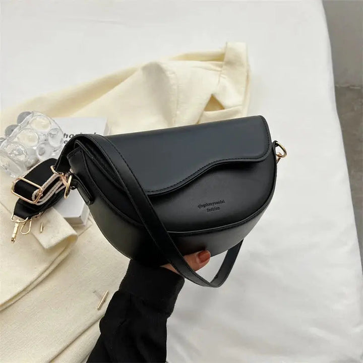 Luxurious women's shoulder bag. Compact & versatile, perfect for everyday style.