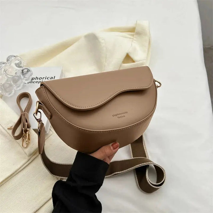 Chic brown women's shoulder bag. Compact design, versatile for daily use & fashion.