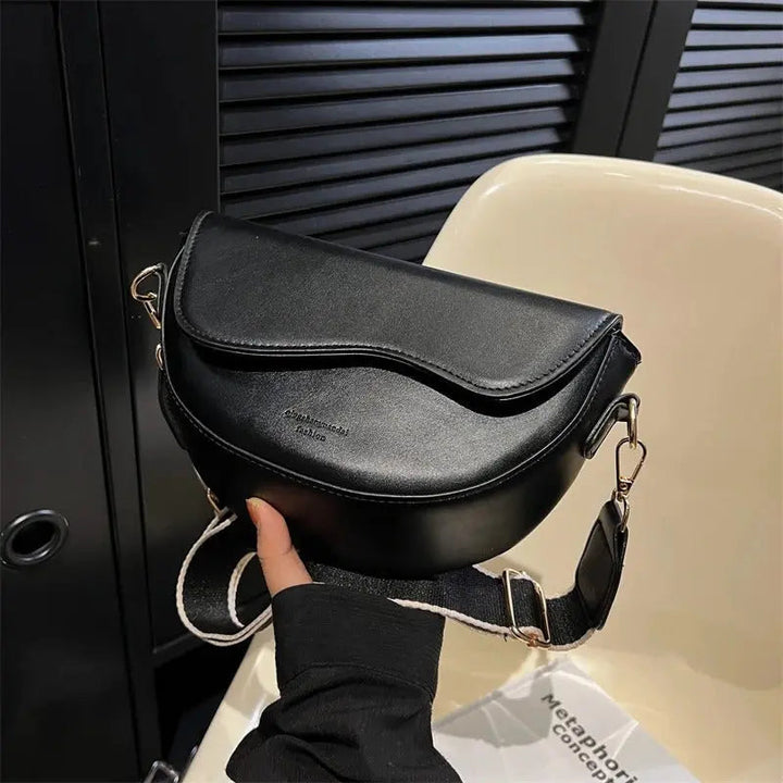 Modern khaki women's shoulder bag. Luxurious compact purse, an elegant everyday accessory.