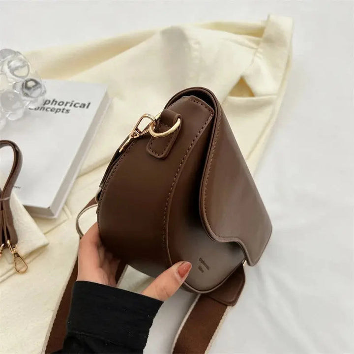 Compact women's shoulder bag. Luxurious and stylish, a versatile fashion purse for any occasion.
