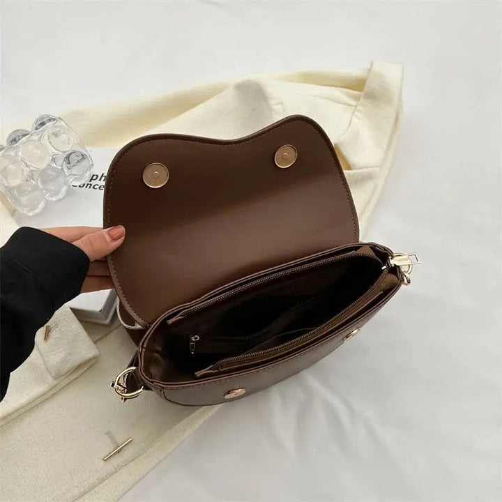 Luxury compact women's shoulder bag. Versatile everyday purse, stylish & functional.