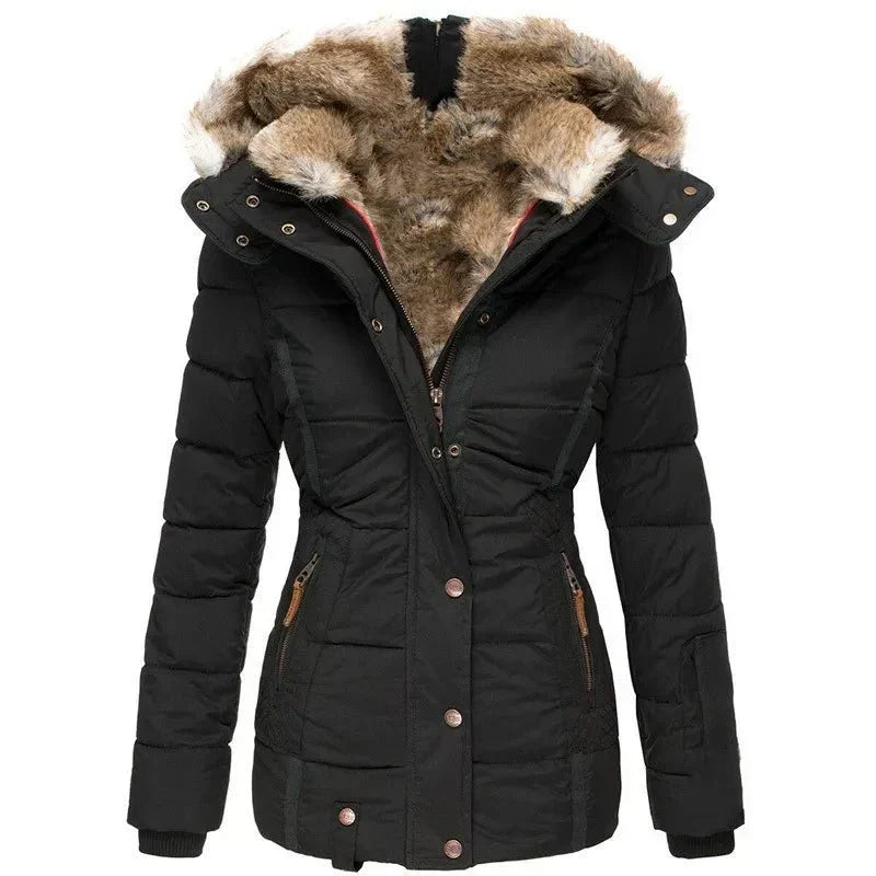 Luxurious women's winter puffer jacket with warm insulation & stylish faux fur hood. Perfect for cold weather.