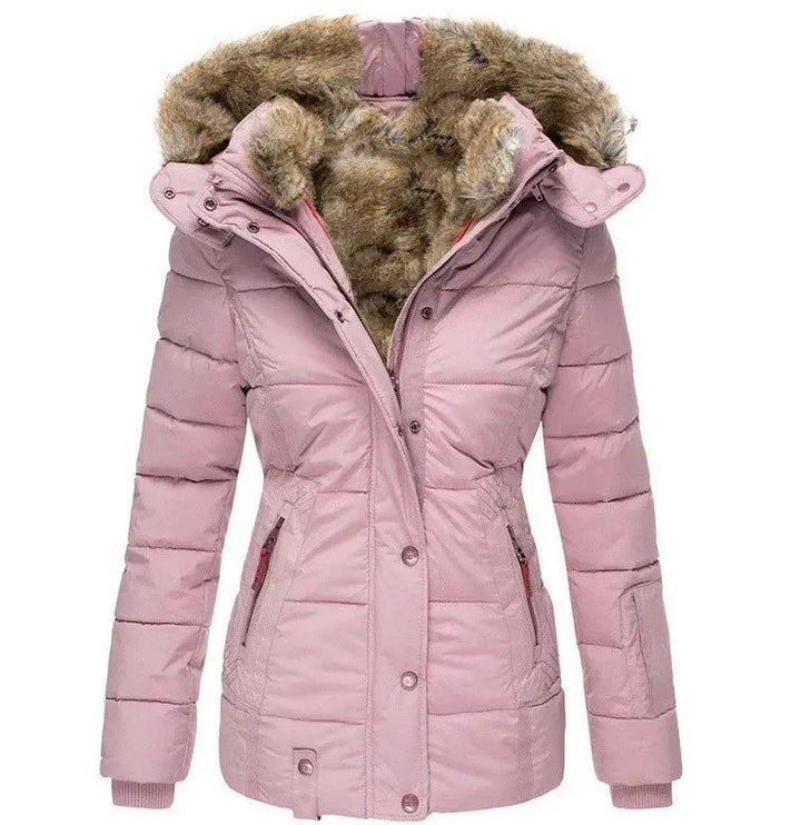 Cozy & stylish women's quilted puffer jacket. Luxury winter coat with a warm faux fur hood for everyday wear.