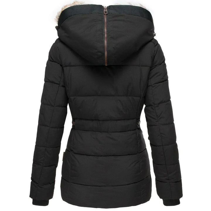 Stylish women's insulated puffer jacket. Elegant cold weather outerwear with a luxurious faux fur hood.