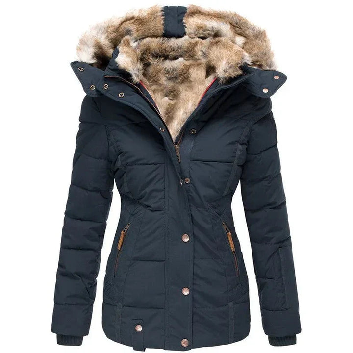 Detail of the fashionable quilted design on a women's luxury puffer jacket, a warm winter coat.