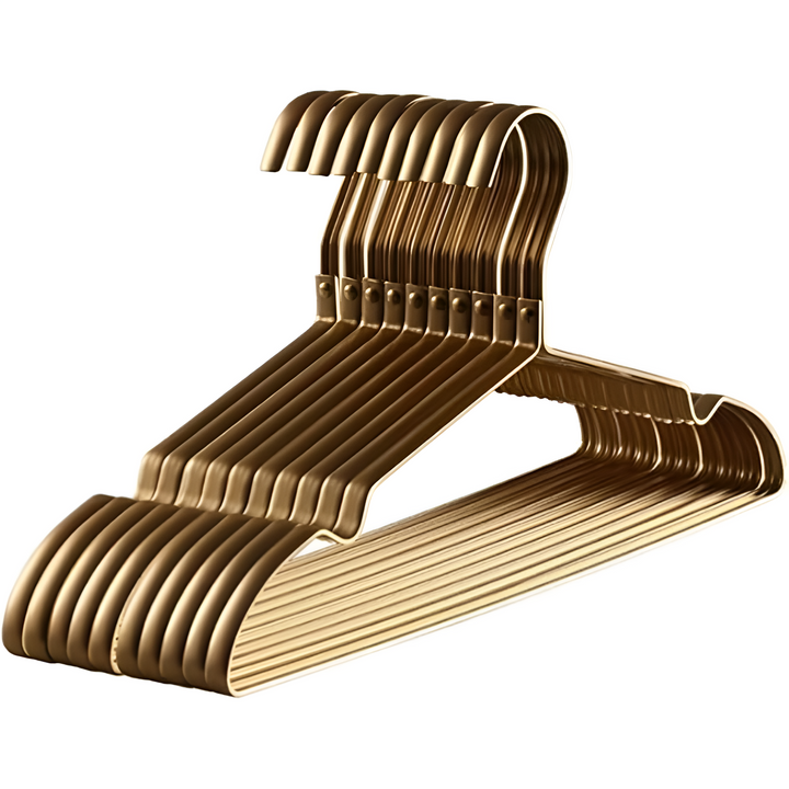 Set of plush black velvet clothes hangers, anti-slip design ensuring garments stay secure in a luxury closet.