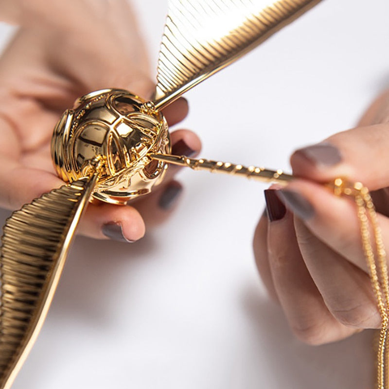 The golden winged orb ring box, a stunning collector's item.