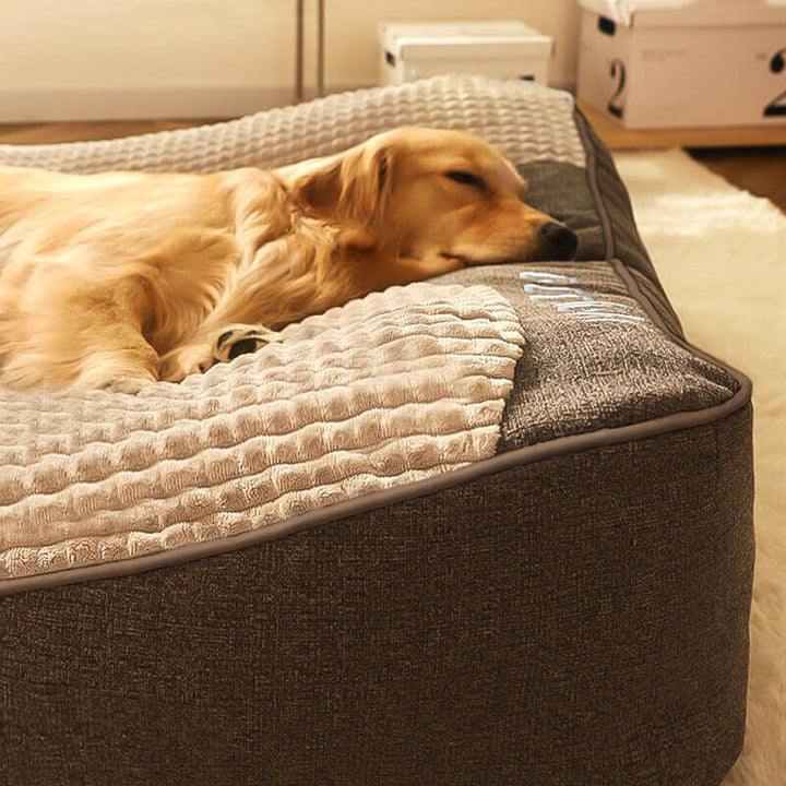 Brown luxury dog bed with headrest, memory foam for pets, featuring a washable cover.