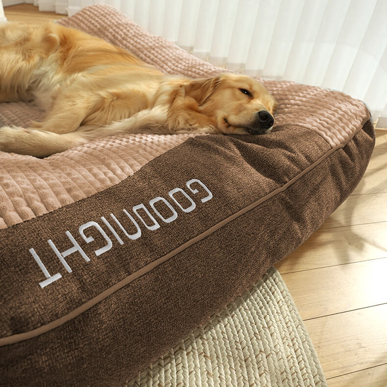 Orthopedic dog bed for large pets, memory foam for joint relief, comfortable headrest.