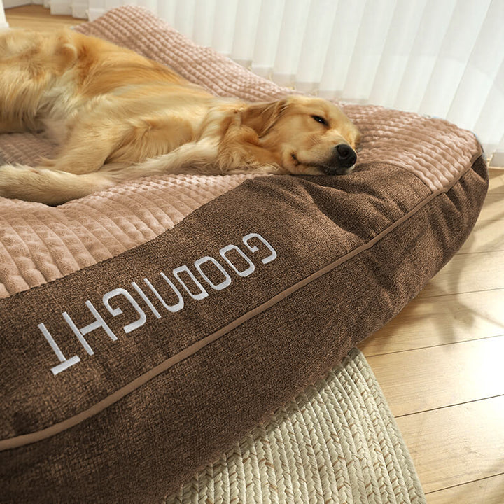 Orthopedic dog bed for large pets, memory foam for joint relief, comfortable headrest.