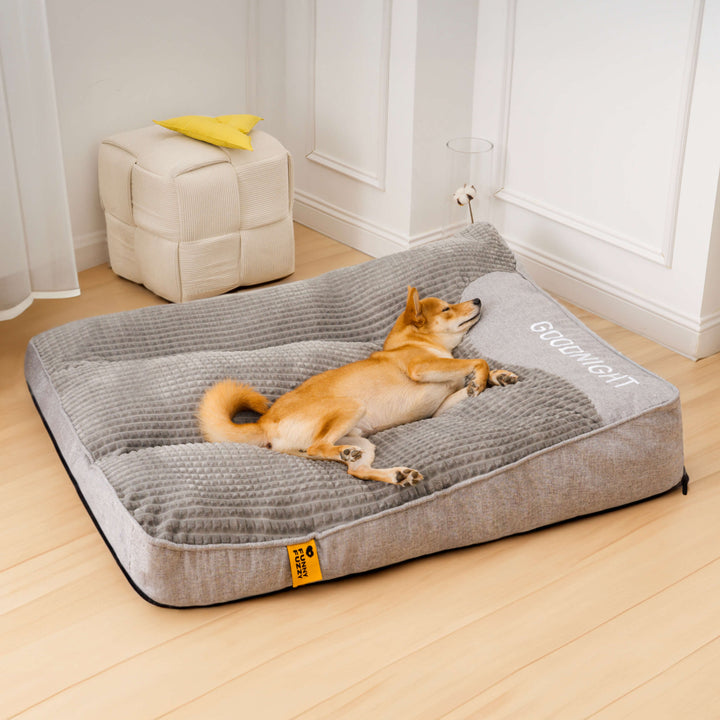 Luxury dog bed with memory foam & headrest, ideal for large pets requiring orthopedic comfort.