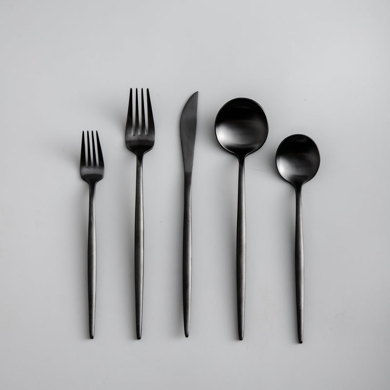 Contemporary matte black tableware set, ideal for elevating any modern kitchen aesthetic.