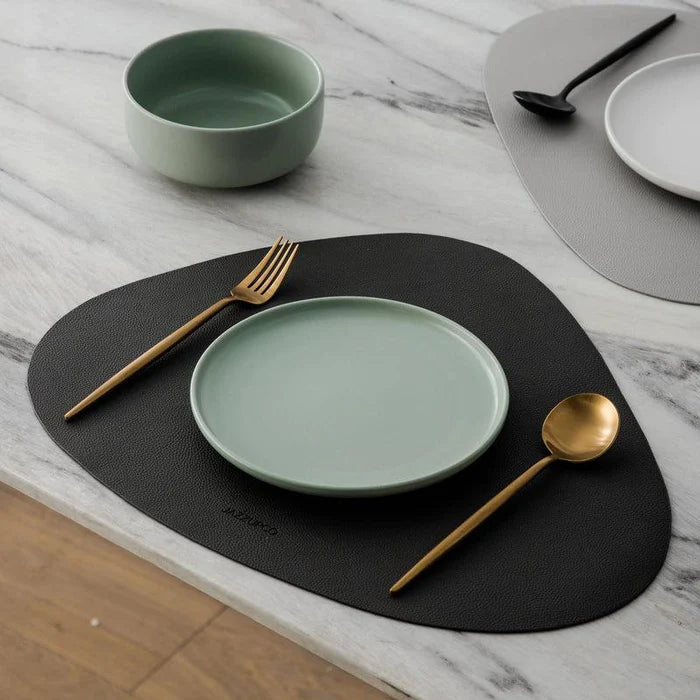 Sleek matte black flatware set, a contemporary choice for kitchen and dining.
