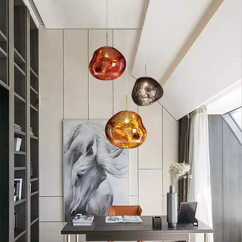 Stylish Melt pendant lamp in red, an atmospheric light object for modern interiors.