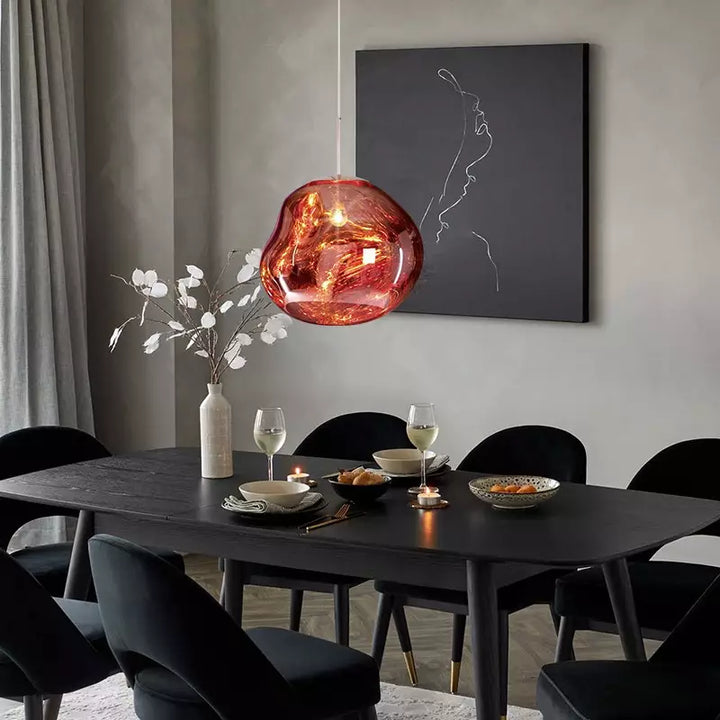 Silver Melt pendant lamp with a unique organic shape, perfect for ambient home lighting.