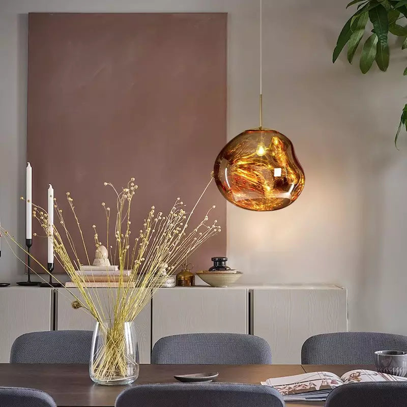 Red Melt pendant lamp suspended, creating a vibrant focal point with its atmospheric light.