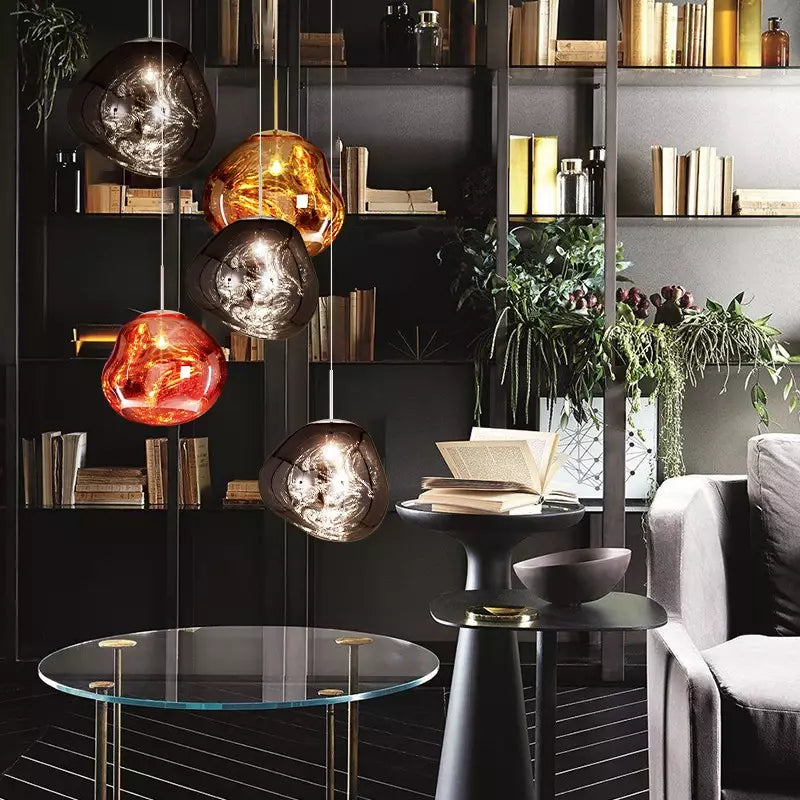Sleek silver Melt pendant lamp, embodying modern lighting trends and elegant home decor.