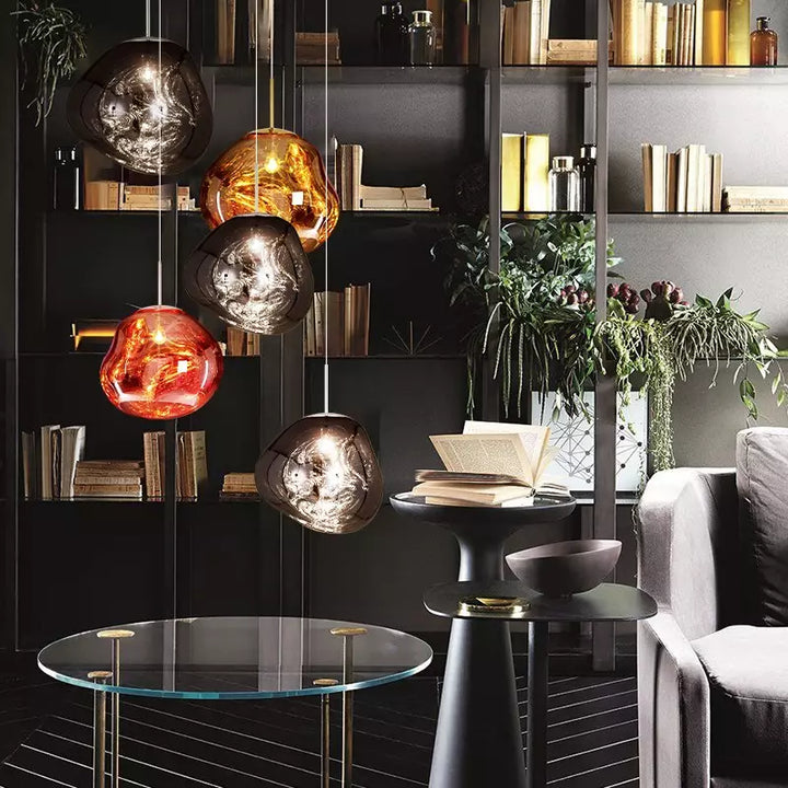 Sleek silver Melt pendant lamp, embodying modern lighting trends and elegant home decor.