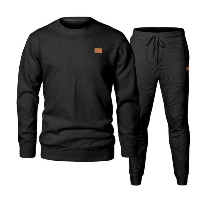 Men's active two-piece tracksuit. Comfortable sweatshirt and joggers with drawstring waist for casual wear.