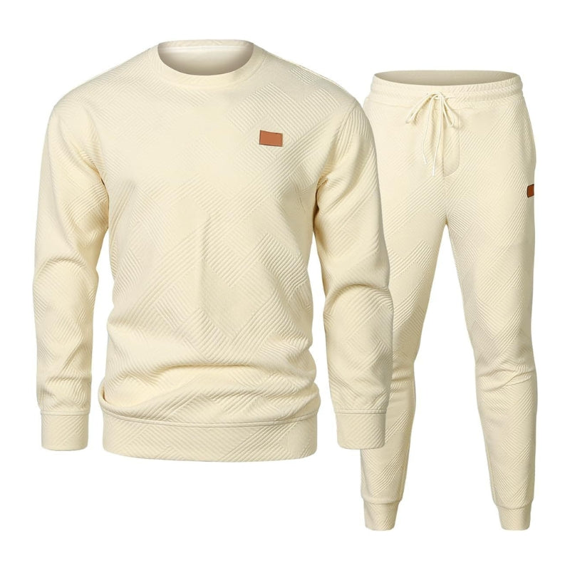 Stylish men's activewear tracksuit: a modern sweatshirt and joggers with a functional drawstring waist.