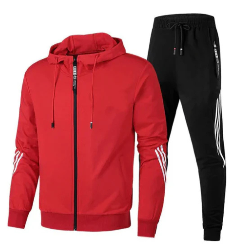 Model wearing a men's casual outfit: a two-piece tracksuit set with a zip hoodie and joggers.