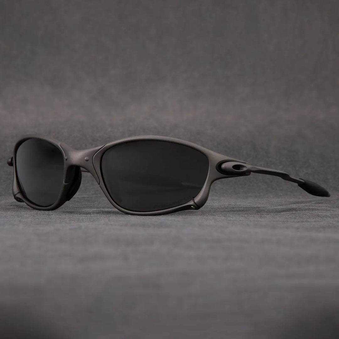Outdoor gear: metallic frame sport sunglasses with polarized red lenses for cycling and sports.