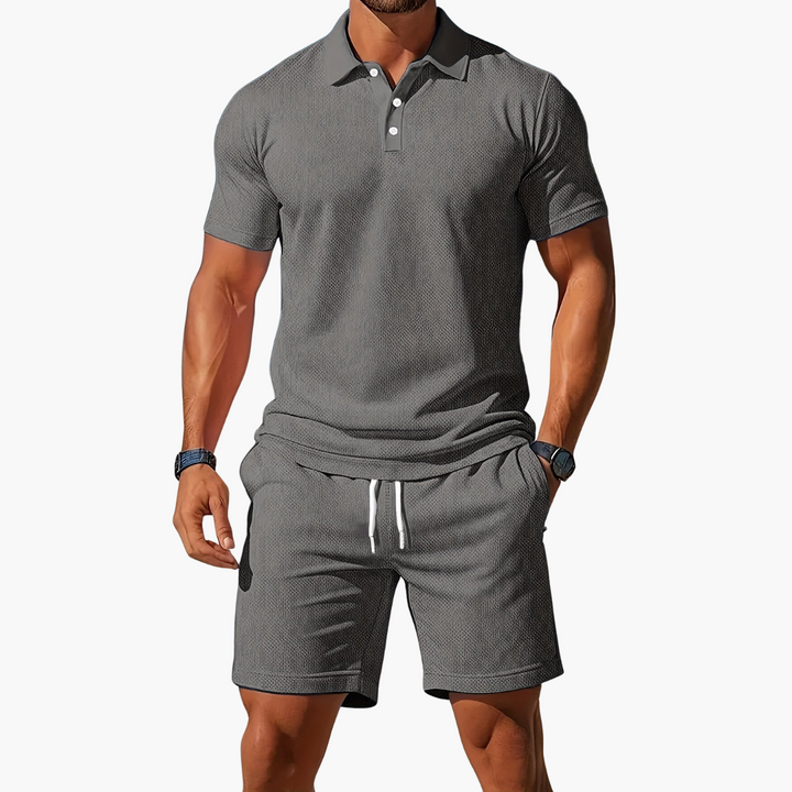 Side view of men's athletic shorts from the summer polo set.