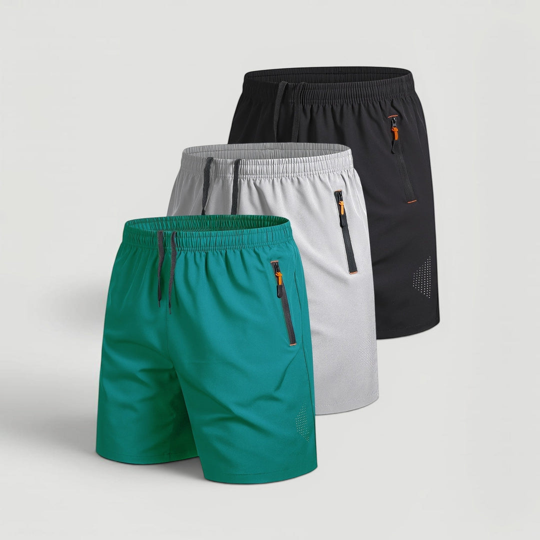 Men's summer shorts 3-pack: athletic style, quick-dry material, & secure zip pockets for active days.