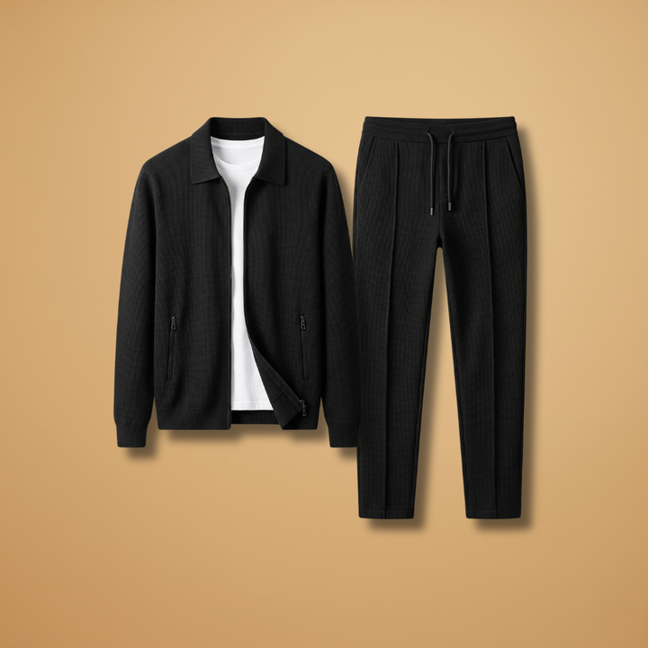 Men's athletic zip jacket and straight pants tracksuit set in navy blue.